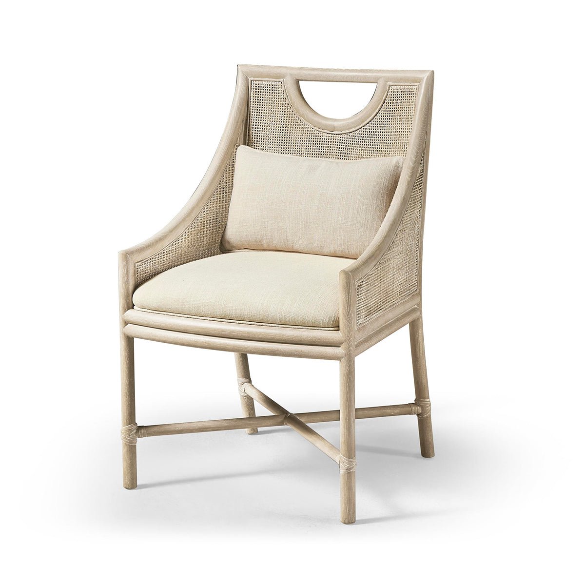 Coastal dining chair with cushion, angled front view.
