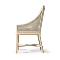 Coastal dining chair, side profile showing woven back.