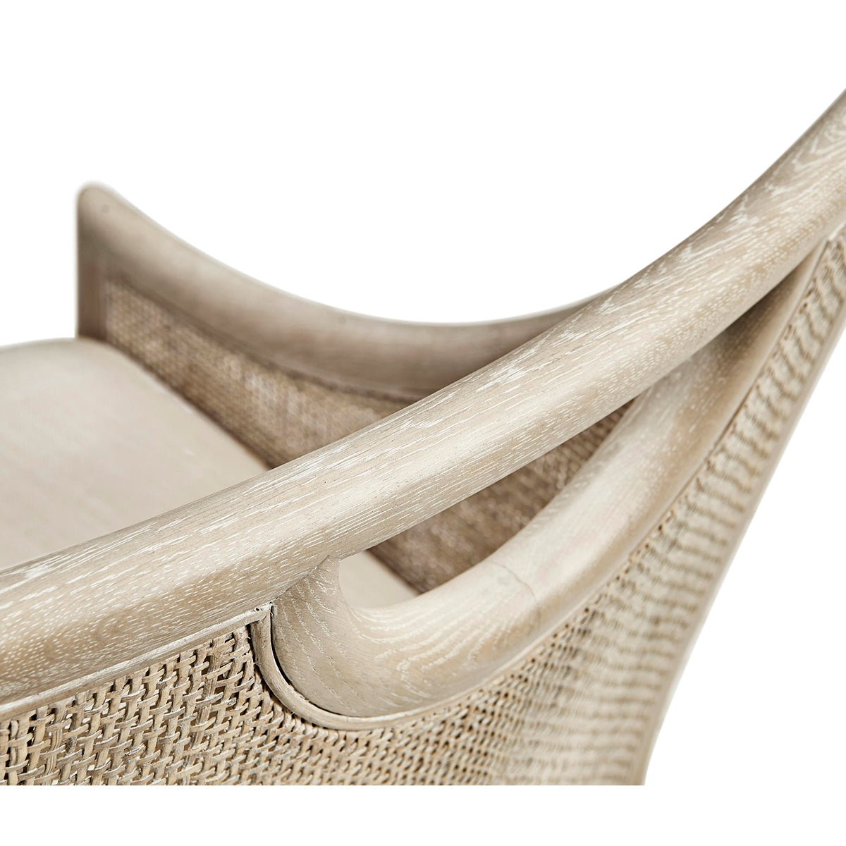 Top view of coastal dining chair's curved handle design.