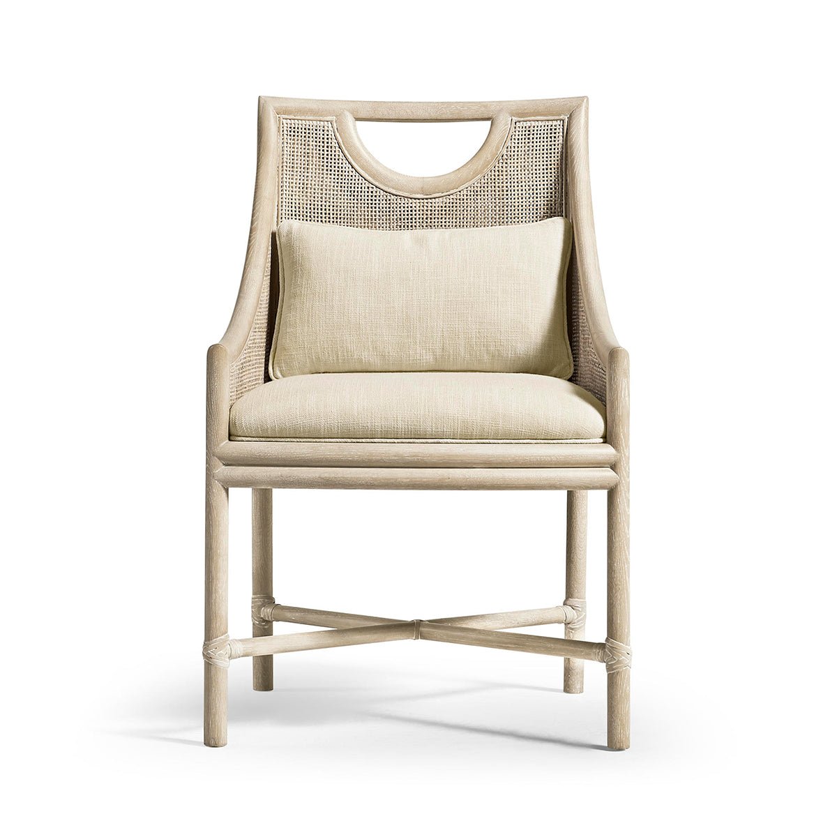 Coastal dining chair, front view with cushion and pillow.