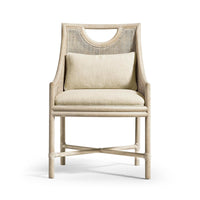 Coastal dining chair, front view with cushion and pillow.