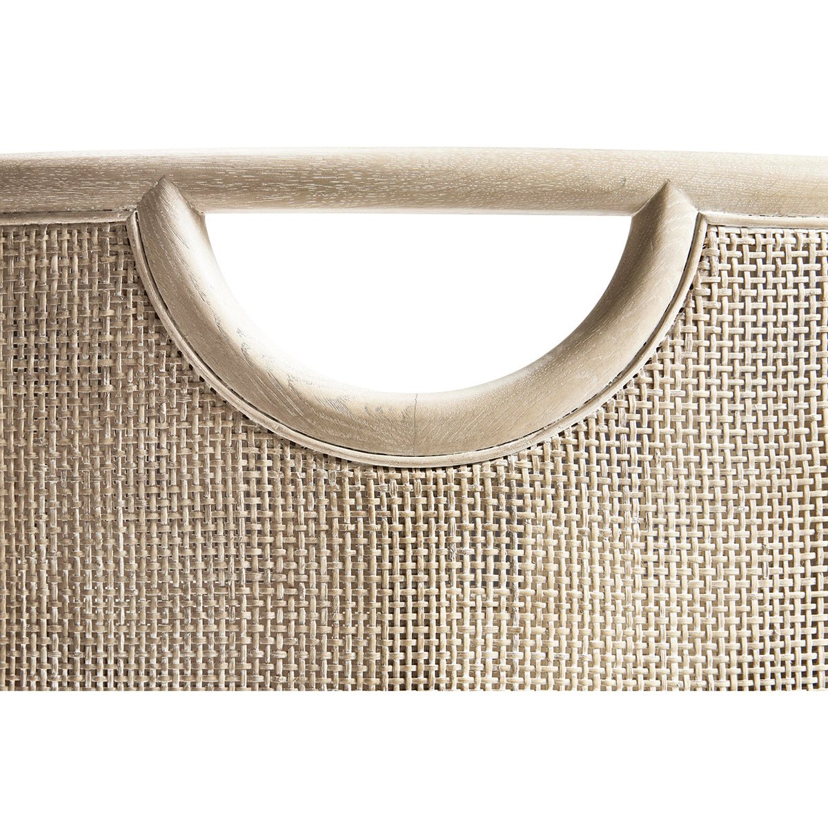 Detail of coastal dining chair's semi-circular back handle.