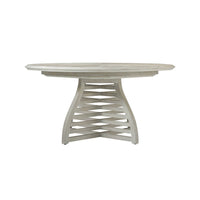 Round table showcasing artistic base, frontal view.
