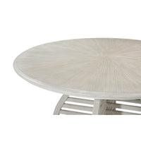 Close-up of dining table's textured top, partial view.