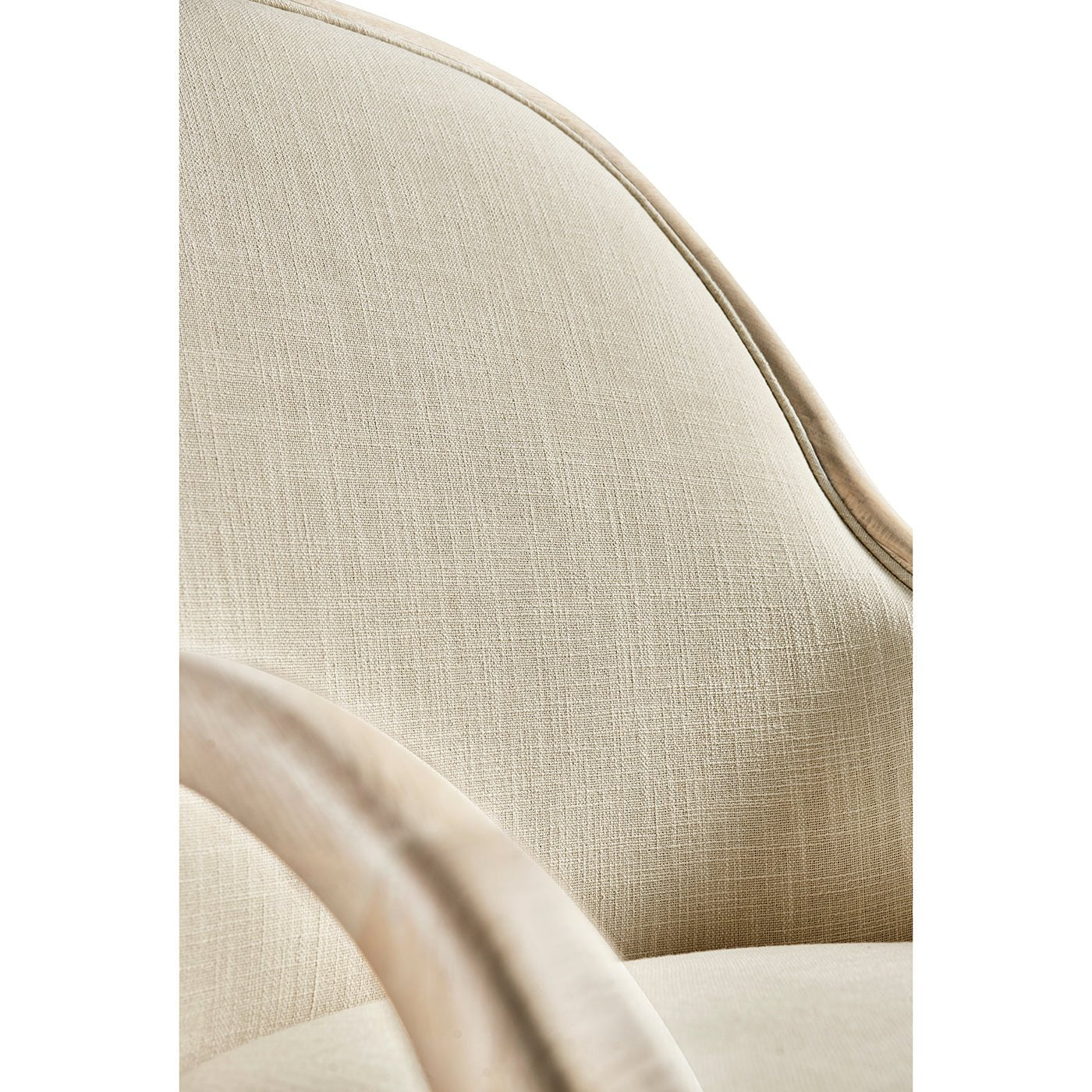 Detailed shot of chair's smooth upholstery fabric.