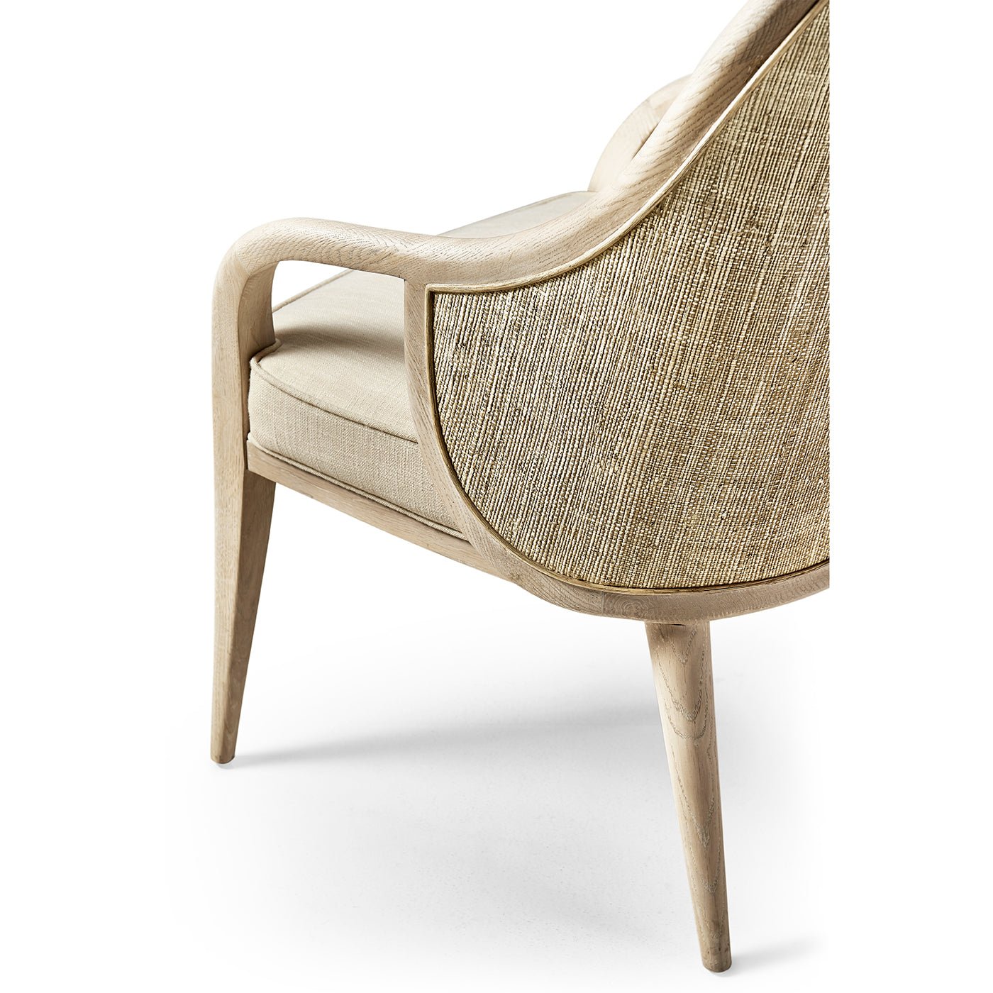 Back angle highlighting chair's upholstery and rear legs.