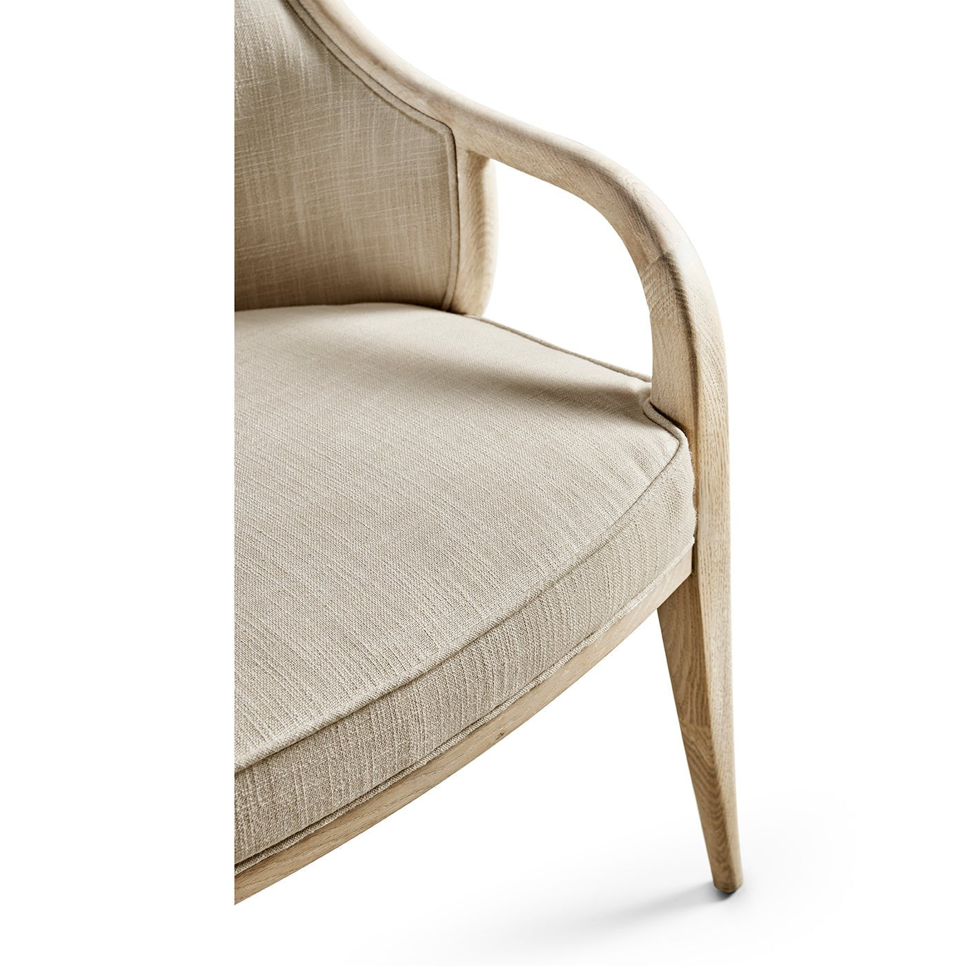 Detailed side view of dining chair armrest and cushion.