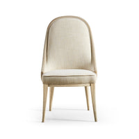 Front view modern coastal upholstered dining chair.