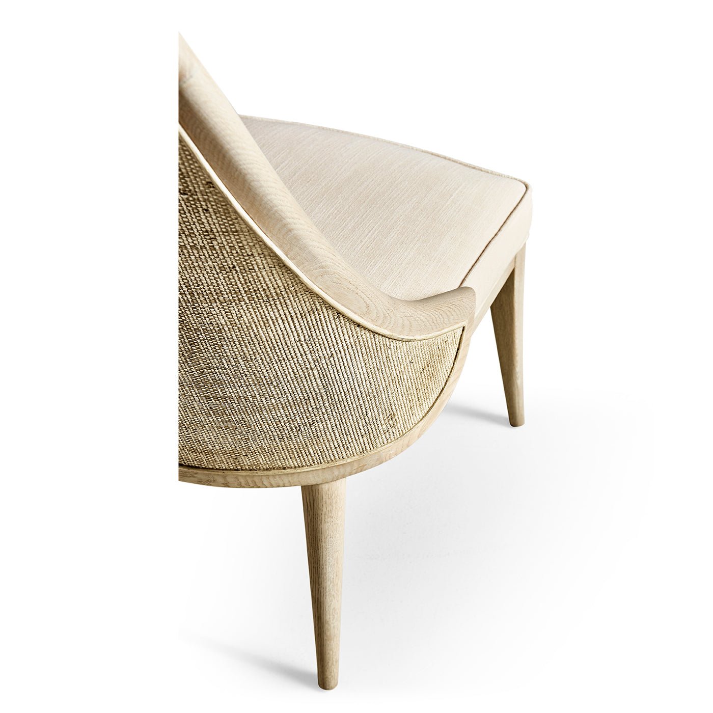 Angled back detail modern coastal upholstered dining chair.