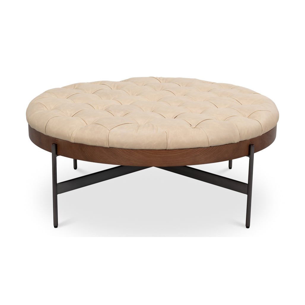 Round cocktail ottoman front view on white background.
