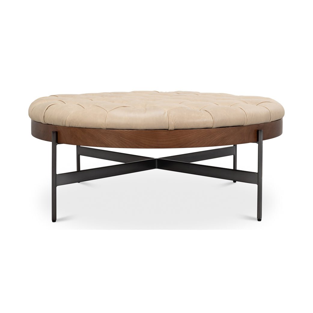 Straight-on view of cocktail ottoman showing leg design.