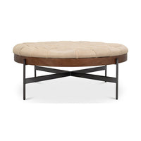 Straight-on view of cocktail ottoman showing leg design.