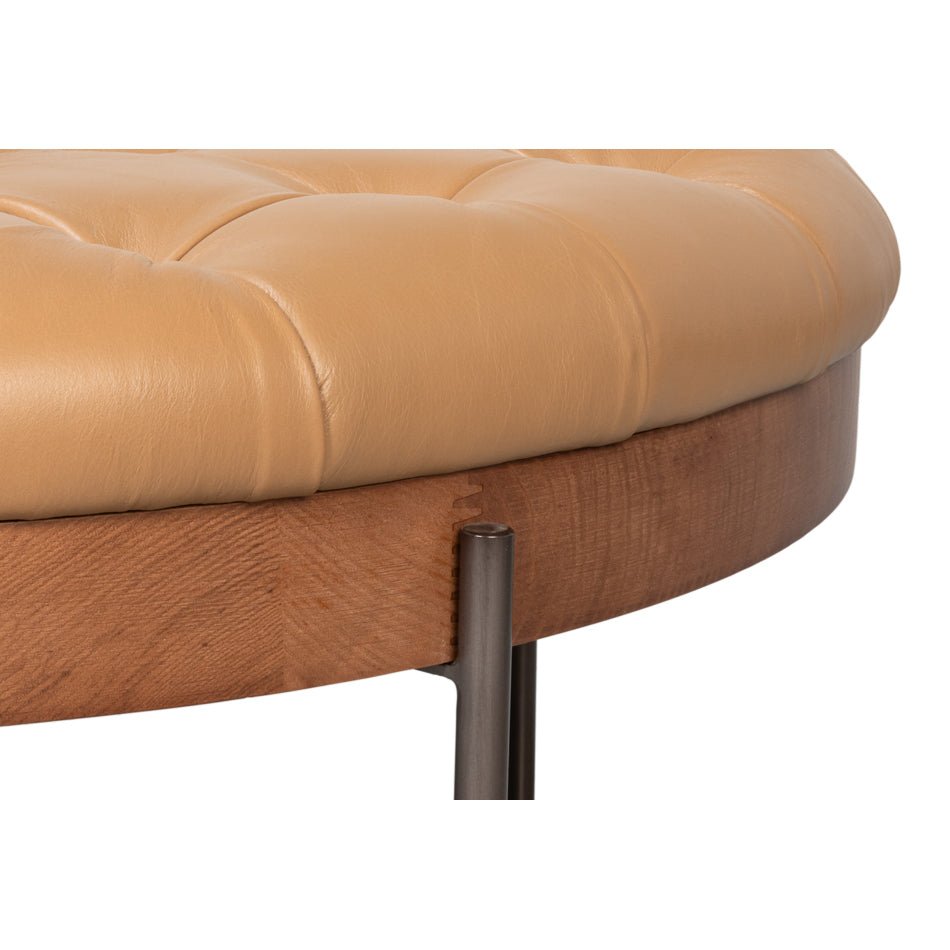 Close-up of ottoman edge with wood finish.