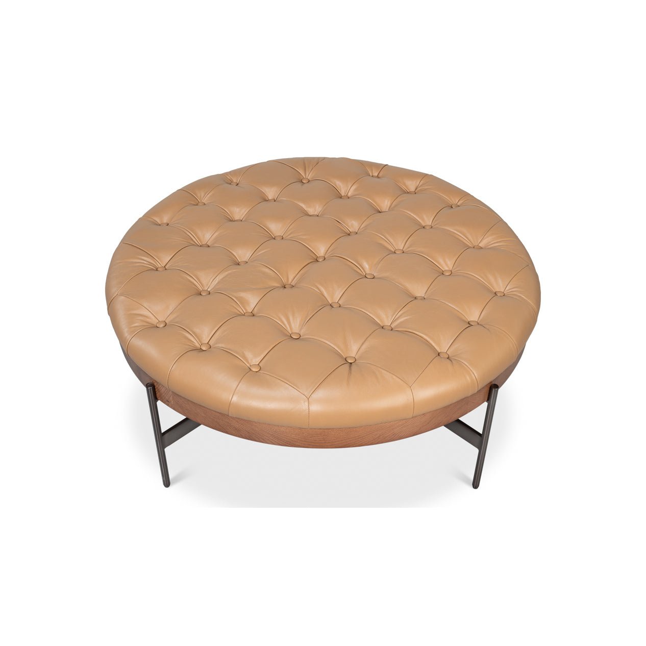 Top view of caramel leather ottoman tufting.