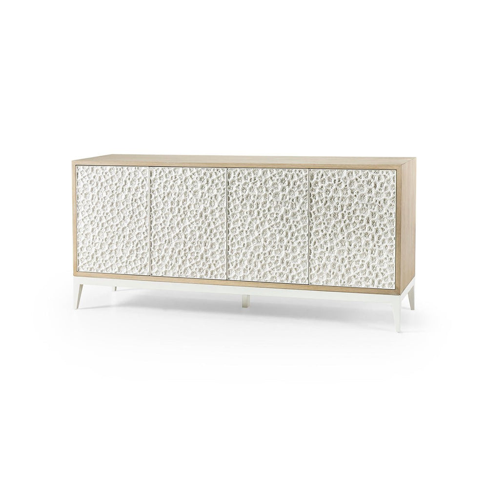 Angled view of modern sideboard with textured doors.