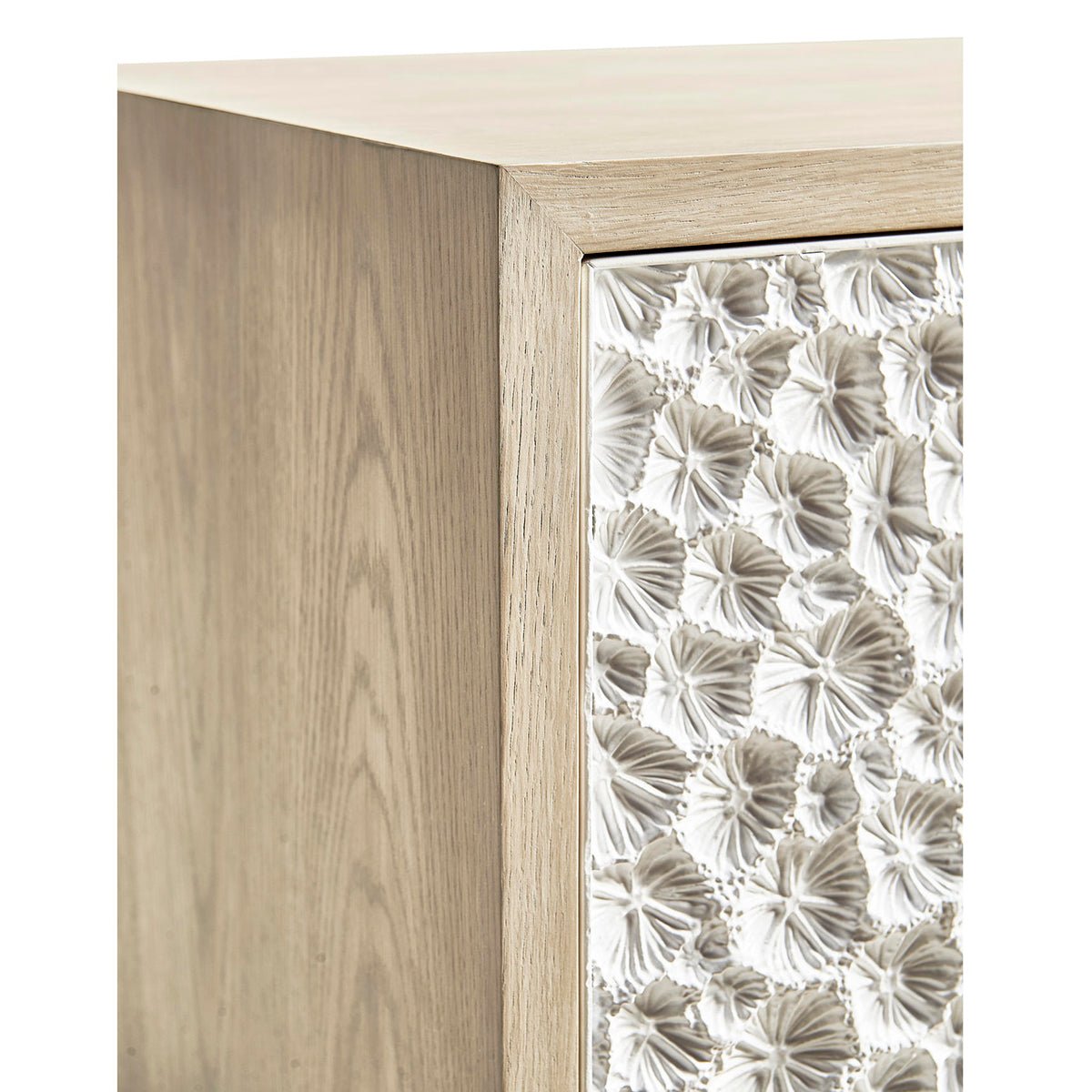 Close-up of sideboard corner detail and textured design.