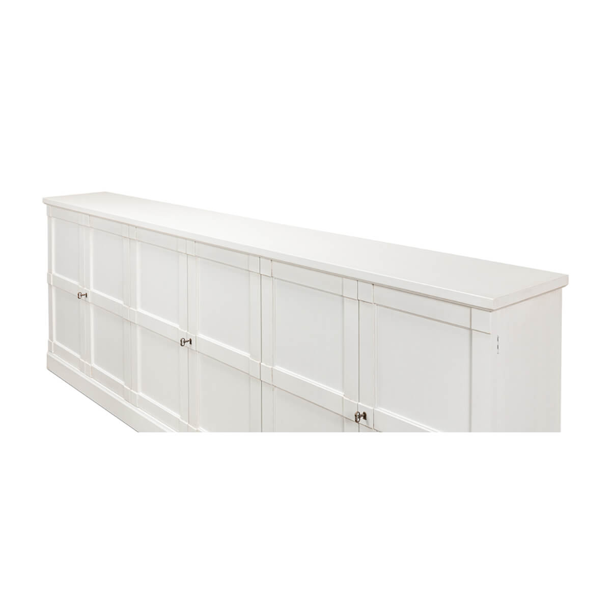 Angled side view of white painted sideboard.