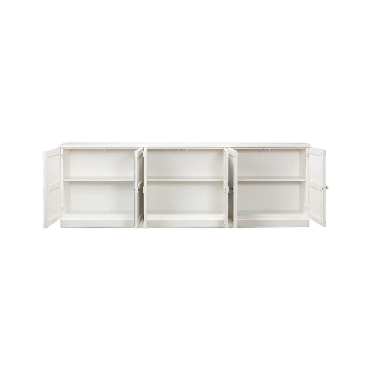 Interior shelves of open white painted sideboard.
