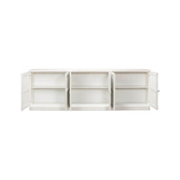 Interior shelves of open white painted sideboard.