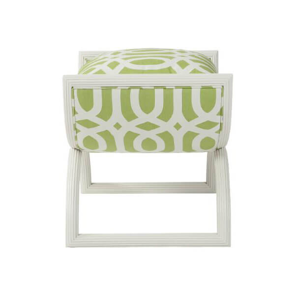 Side view of green modern curule stool, cushion visible.