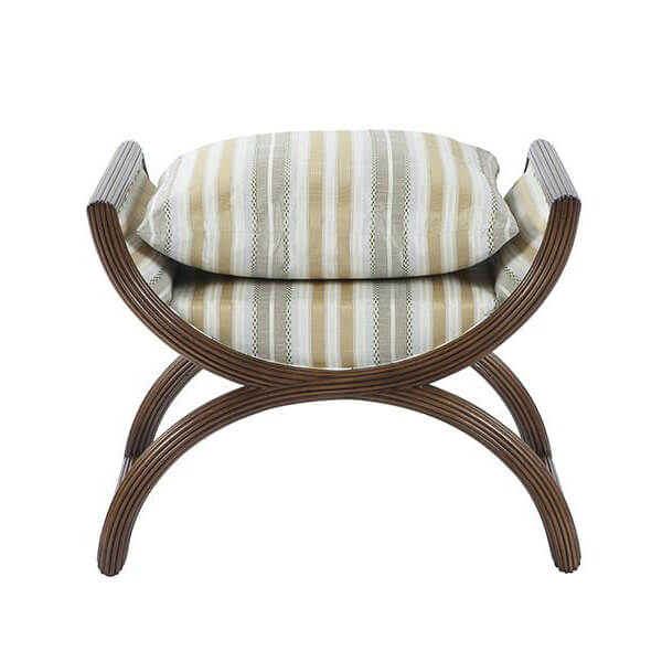 Front view of striped modern curule stool, cushion visible.