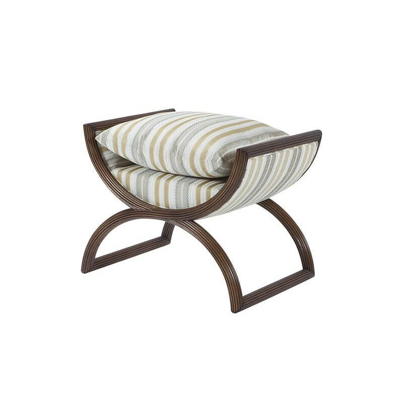Striped modern curule stool, angled view with cushion.