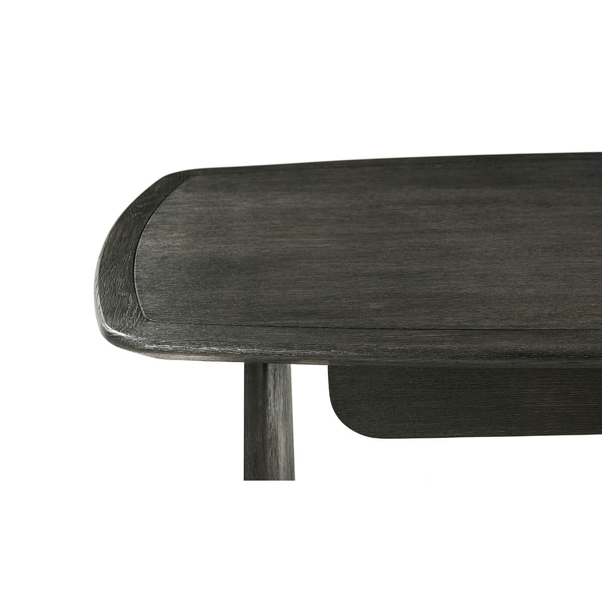 Close-up of modern desk edge and leg design.