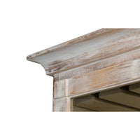 Top corner of hutch with distressed molding.