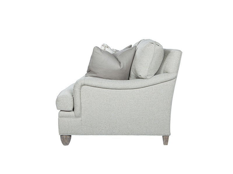 Modern English arm sofa side profile with pillows