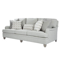 Modern English arm sofa angled front view with pillows