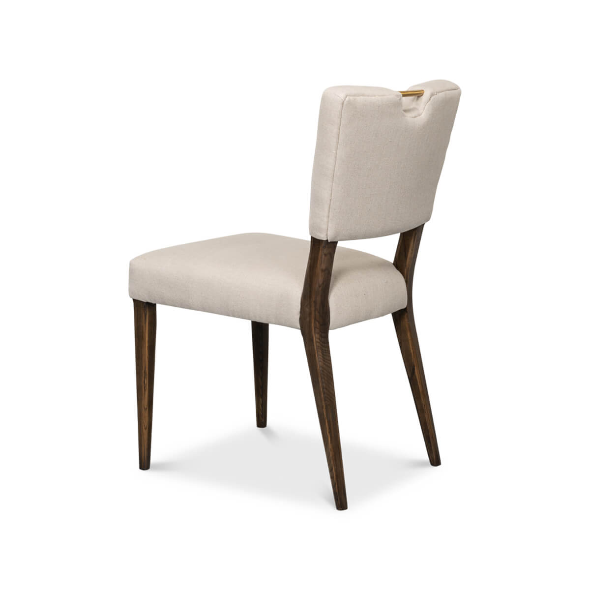 Angled back view of modern dining chair with wood legs.