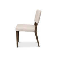 Side profile of modern English dining chair.
