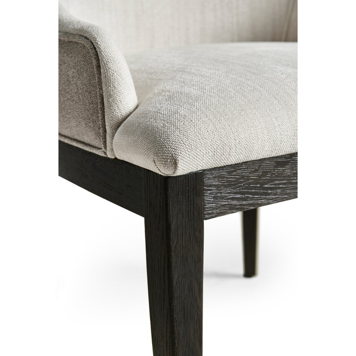 Modern English side chair, close-up of seat and leg.