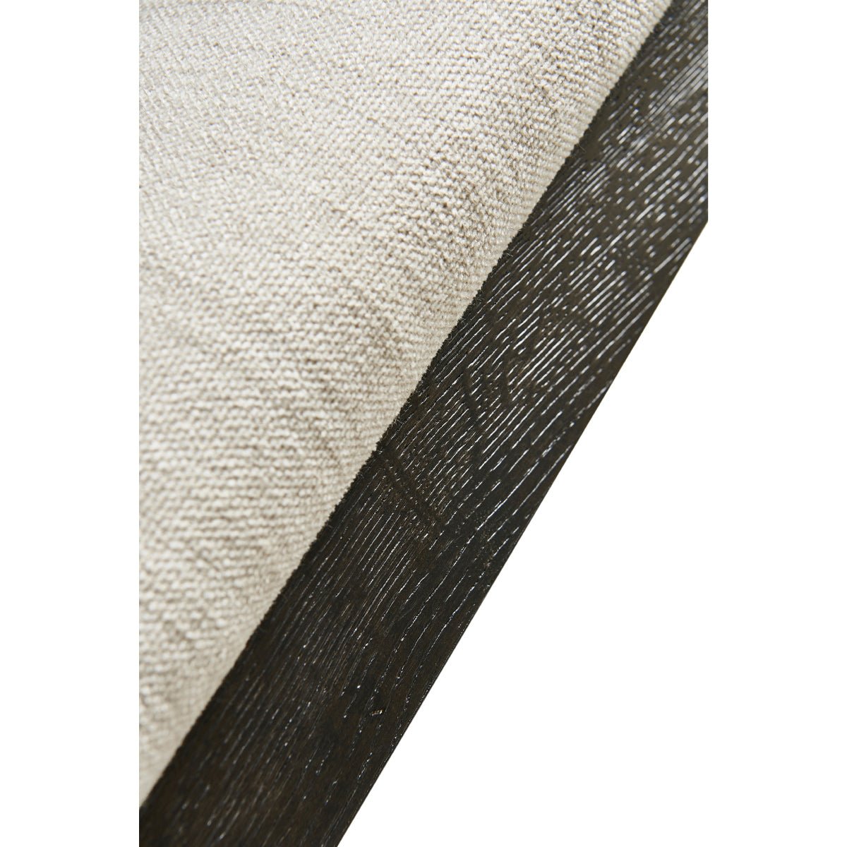 Modern English side chair, close-up of fabric and wood.