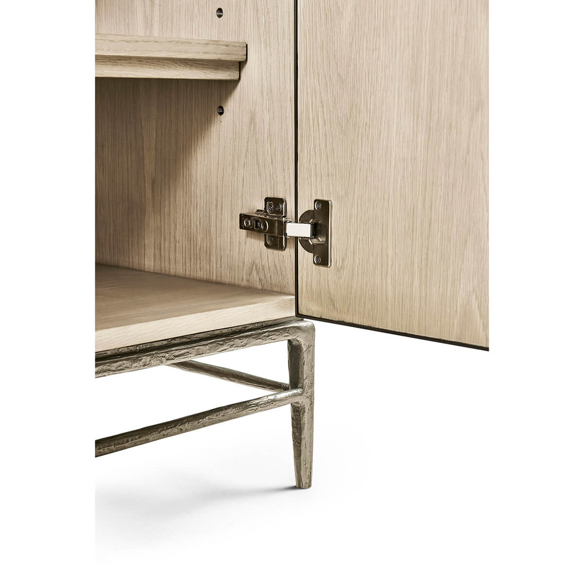 Close-up of cabinet door hinge and shelf