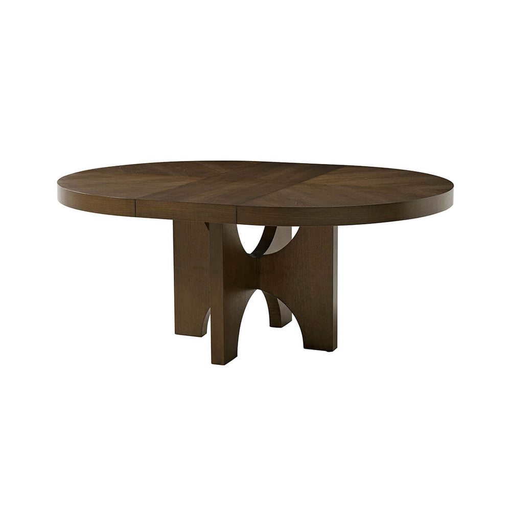 Oval extending dark ash dining table, full view.