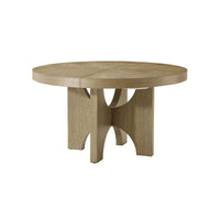 Extending round dining table, side perspective view.