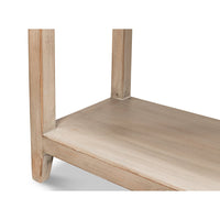 Lower shelf of modern farmhouse console table close-up.