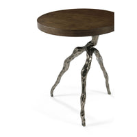Table side profile with organic-style metal leg structure.