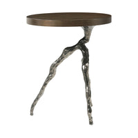 Angular view of modern faux bois table with unique base.