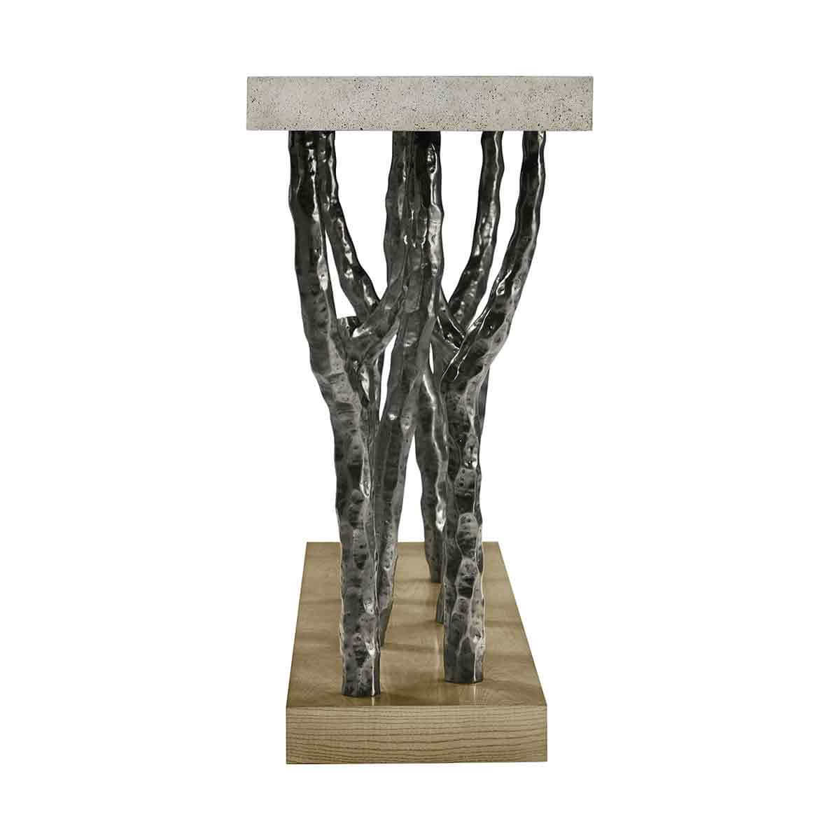 Side view of console table's intricate branch-like legs.