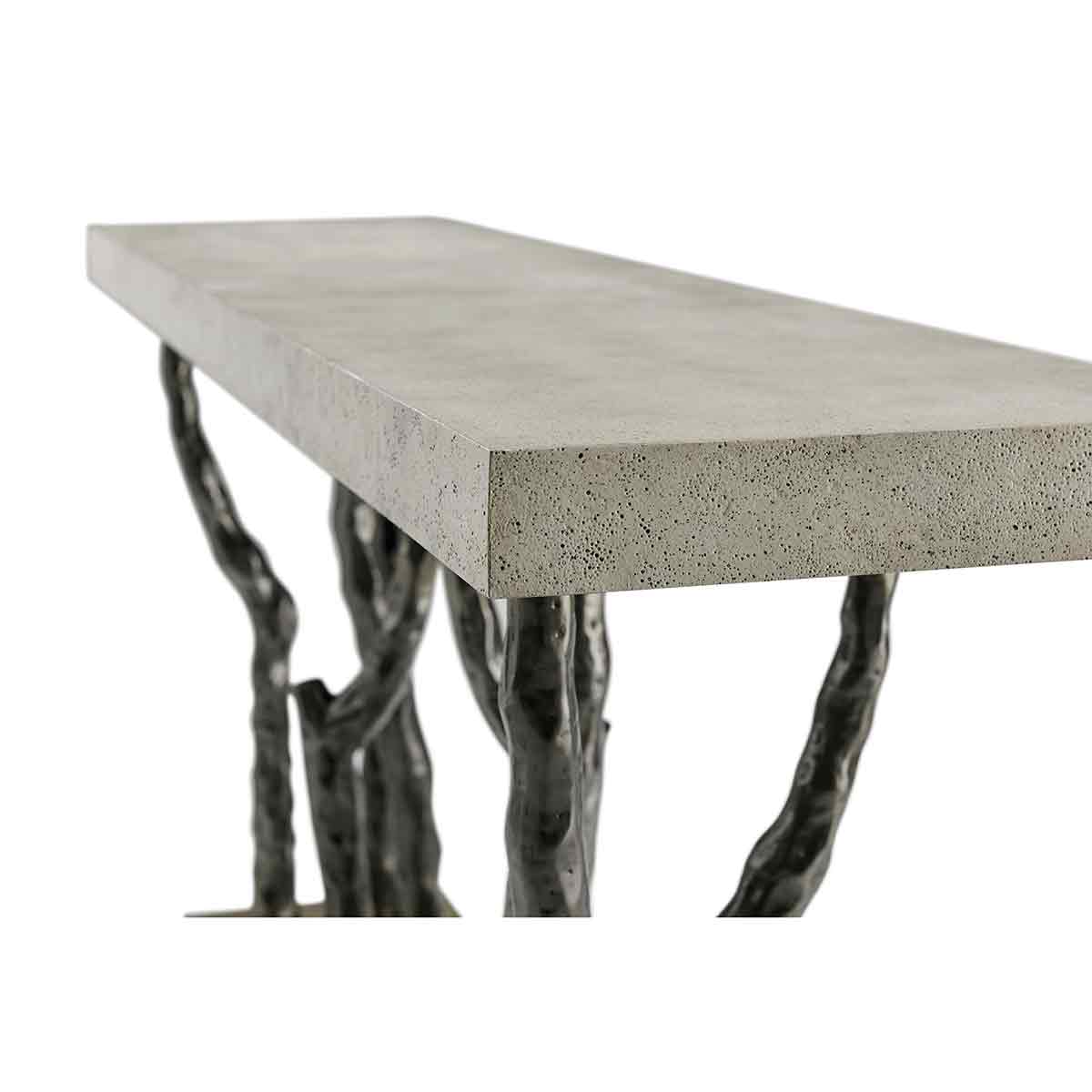 Close-up of faux bois console table's textured concrete top.