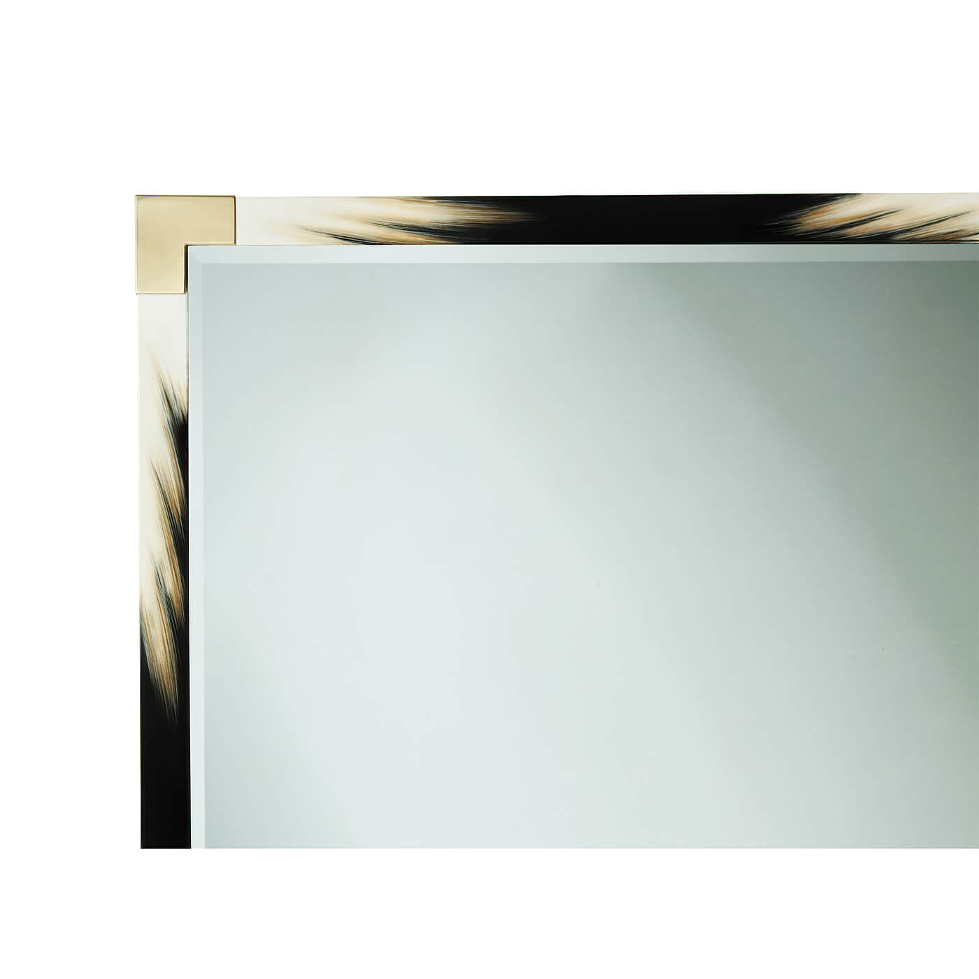 Close-up corner detail of modern faux horn mirror.
