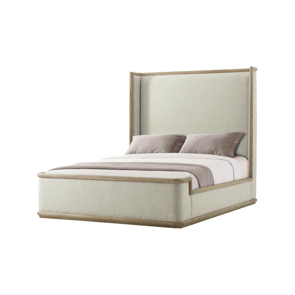 Angled view of modern upholstered bed without pillows.