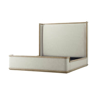 Side perspective of the modern upholstered bed, light oak.