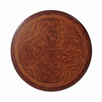 Top view of wooden round table surface design.