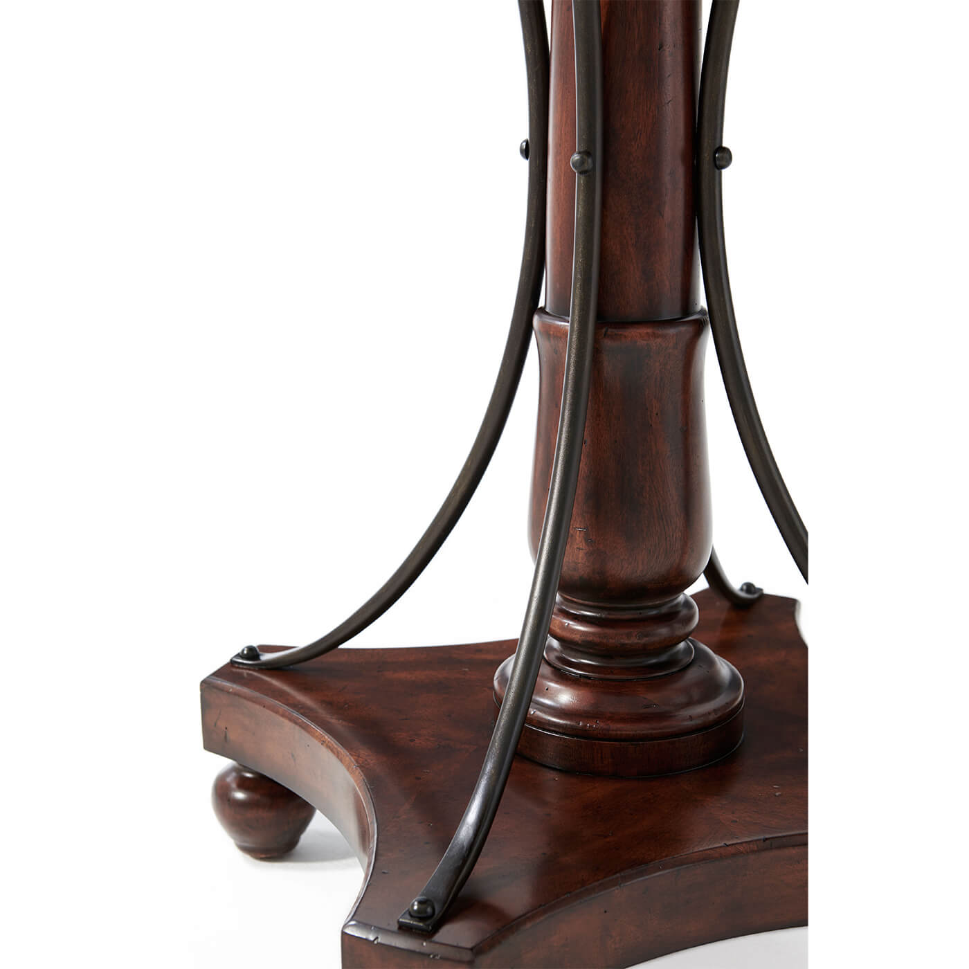 Close-up of table's base with metal support detail.