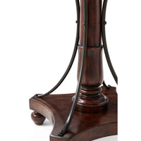 Close-up of table's base with metal support detail.