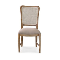 Modern French dining chair front view close-up.