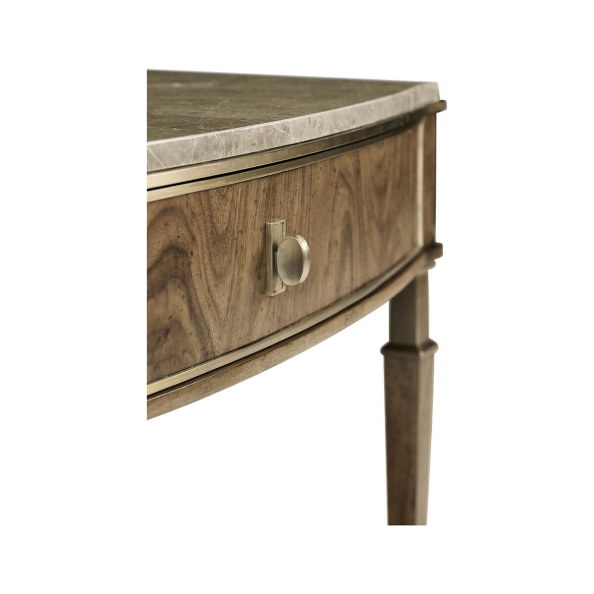 Close-up of walnut nightstand drawer with round knob.
